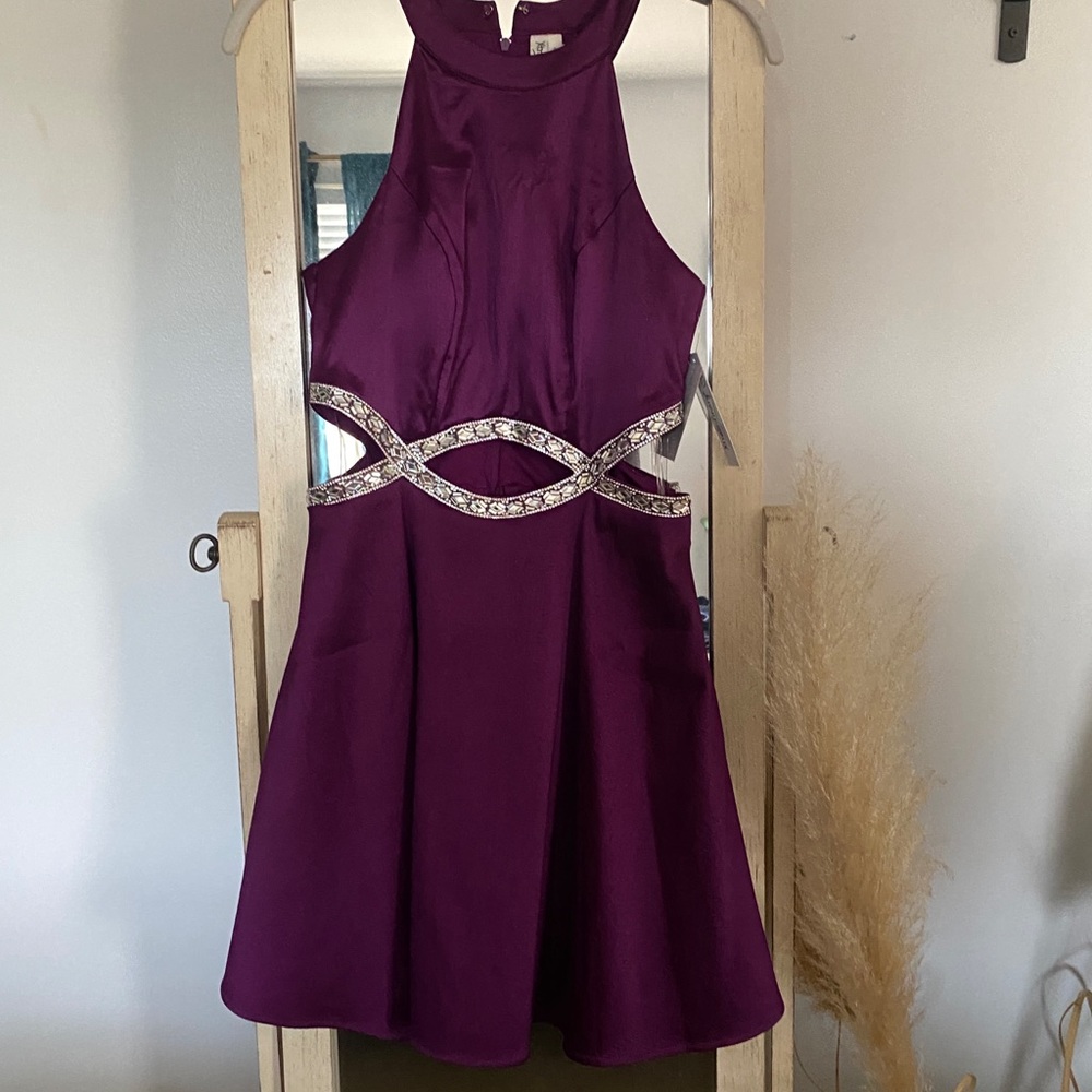 Plum colored formal with gem beading ***NWT***